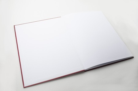 Blank Opened Book shoot with white background.の写真素材