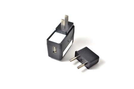 USB Plug. Shoot over white background. Focus on the closes part. Shallow depth of field.