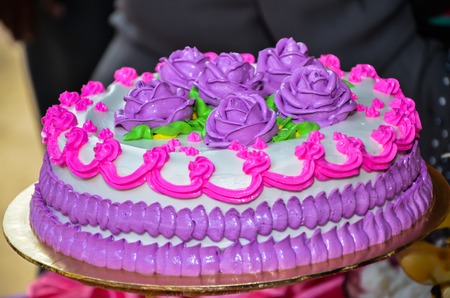 Wedding cakes on wedding ceremony. Bride and groom will cut the cake into slices and let the audience taste the cake.の写真素材