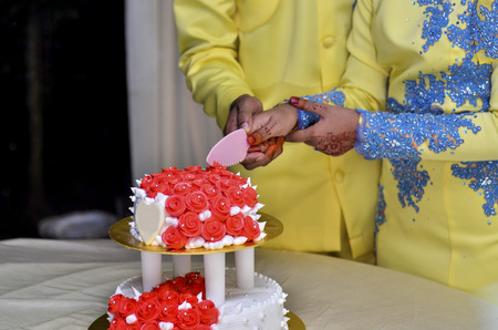 Wedding cakes on wedding ceremony. Bride and groom will cut the cake into slices and let the...