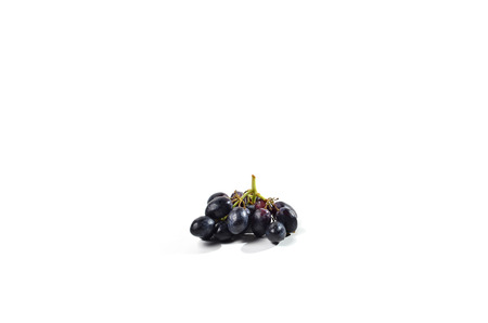 Black Grapes shoot over white backgroundの写真素材