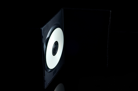 CD DVD with case box over black backgroundの写真素材