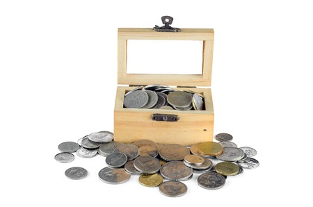 Malaysian coin in wood container box over white backgroundの写真素材