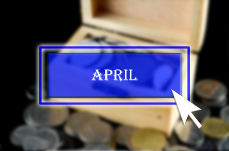 Business background with blue button, mouse icon and text written aprilの写真素材