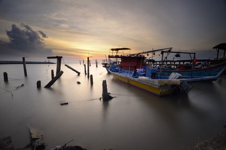Bunch of boat at fisherman boat parking during sunsetの写真素材