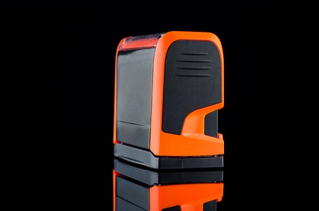 Orange Office stamp on black background with reflection