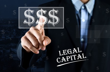 Business man pointing hand on transparent money symbol with text written Legal Capital