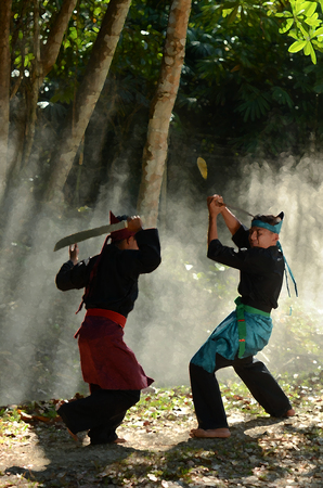 Drawing/Painting of Malaysian Famous Martial Art called Silat Performing Action of training in a jungleの写真素材