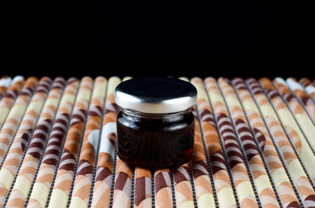 Pure bee's honey in glass containerの写真素材