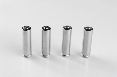 Battery over white background