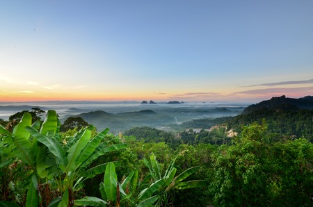 Sunrise from top of a mountain with beautiful panoramaの写真素材