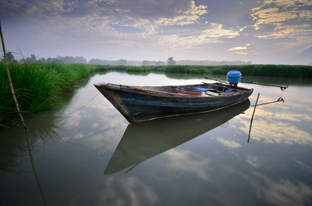 Fisherman Boat used to catch fish in lakeの写真素材