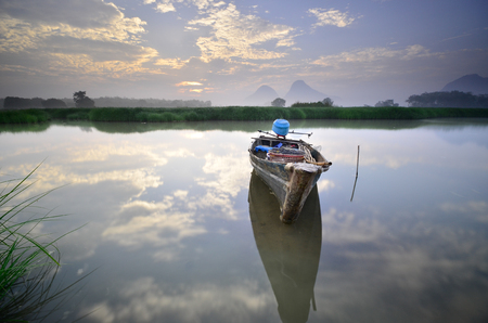 Fisherman Boat used to catch fish in lakeの写真素材