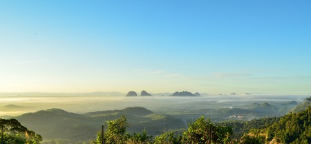 Sunrise from top of a mountain with beautiful panoramaの写真素材