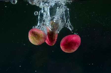 God's Crown fruit in splashの写真素材