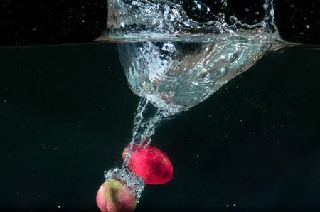 God's Crown fruit in splashの写真素材