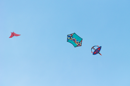 Close view of kite flying in blue skyの写真素材
