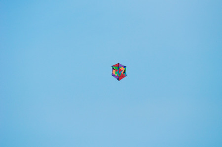 Close view of kite flying in blue skyの写真素材