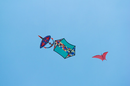 Close view of kite flying in blue skyの写真素材