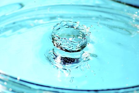 beautiful blue water drop in freezing motion H20 の写真素材