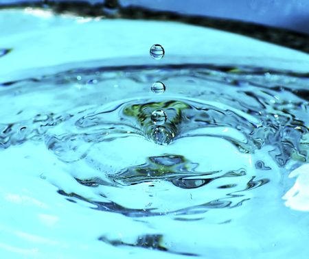 beautiful blue water drop in freezing motion H20 の写真素材