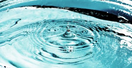 beautiful blue water drop in freezing motion H20 の写真素材