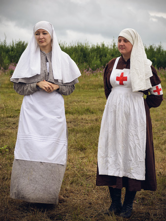 POKROVSKOE, SVERDLOVSK OBLAST, RUSSIA - JULY 17, 2016: Historical reenactment of Russian Civil war in the Urals in 1919. The sisters of mercyのeditorial素材