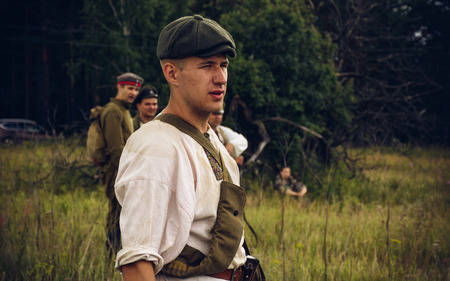 POKROVSKOE, SVERDLOVSK OBLAST, RUSSIA - JULY 17, 2016: Historical reenactment of Russian Civil war in the Urals in 1919. Soldier of the militiaのeditorial素材