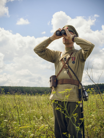 POKROVSKOE, SVERDLOVSK OBLAST, RUSSIA - JULY 17, 2016: Historical reenactment of Russian Civil war in the Urals in 1919. Soldier Of The White Armyのeditorial素材