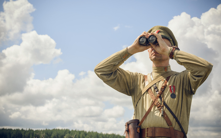 POKROVSKOE, SVERDLOVSK OBLAST, RUSSIA - JULY 17, 2016: Historical reenactment of Russian Civil war in the Urals in 1919. Soldier Of The White Armyのeditorial素材