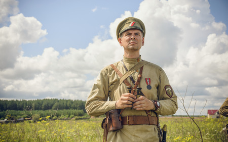 POKROVSKOE, SVERDLOVSK OBLAST, RUSSIA - JULY 17, 2016: Historical reenactment of Russian Civil war in the Urals in 1919. Soldier Of The White Armyのeditorial素材