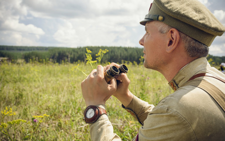 POKROVSKOE, SVERDLOVSK OBLAST, RUSSIA - JULY 17, 2016: Historical reenactment of Russian Civil war in the Urals in 1919. Soldier Of The White Armyのeditorial素材