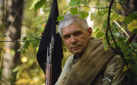 TAVATUI, SVERDLOVSK OBLAST, RUSSIA - AUGUST 20, 2016: Historical reenactment of Russian Civil war in...