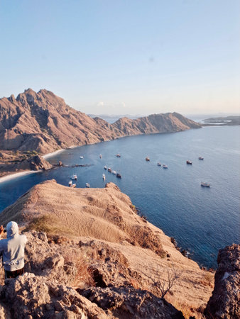 Tourists visit the caldera in Santorini, Greece. Santorini is one of the most popular tourist destinations in the world.の写真素材