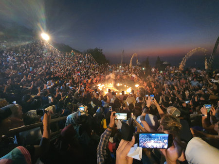 Crowds of people attending a concert in front of the Doi Suthep temple at night.の写真素材