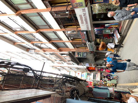 Unidentified people shopping on the street in Bangkok. Bangkok is the capital and the most populous...