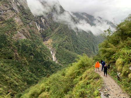 People walking along the road in the Himalayas, Annapurna Conservation Area, Nepalの写真素材