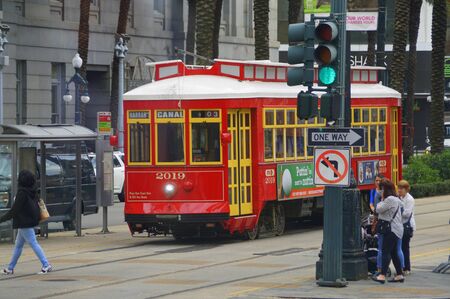 New Orleans, Louisiana, U.S.A - February 4, 2020 - The red streetcar on Canal Streetのeditorial素材