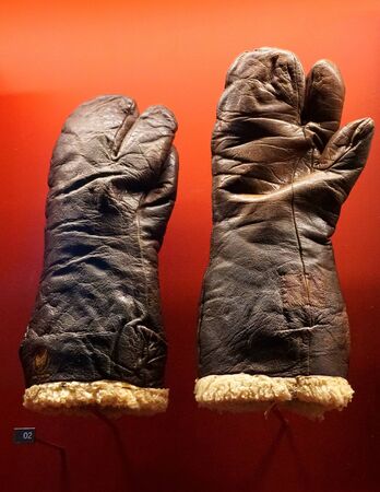 New Orleans, Louisiana, U.S.A. - February 5, 2020 - Type A9 winter flying gloves worn by bombardier during World War 2のeditorial素材