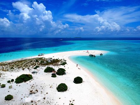 Aerial view of the stunning white sandbank with beautiful sandy beaches of Maldivesの写真素材