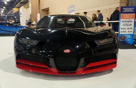 Philadelphia, Pennsylvania, U.S.A - February 9, 2020 - The front view of black and red Bugatti Chiron supercarのeditorial素材