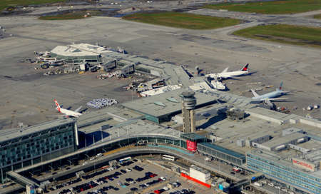 Quebec, Canada - October 27, 2019 - The aerial view of the terminals and planes near MontrÃ©alâPierre Elliott Trudeau International Airportのeditorial素材