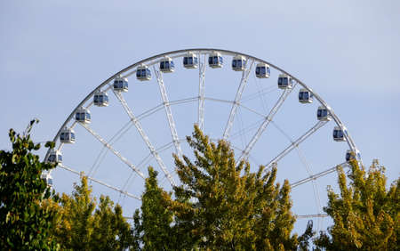 Quebec, Canada - October 27, 2019 - The distance view of Montreal Observation Wheel in the fall