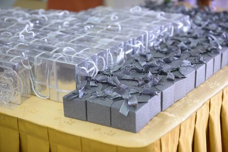 Boxes of silver and grey wedding gifts for the guestsの写真素材