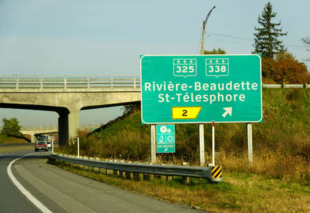 Montreal, Canada - October 28, 2019 - The view of the highway with Exit 2 through Route 325 and...