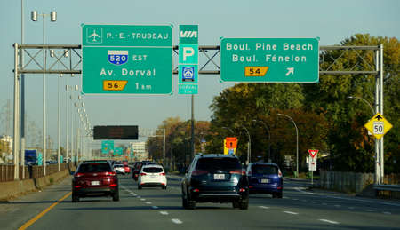 Montreal, Canada - October 28, 2019 - The view of the traffic on the highway towards the airport and...