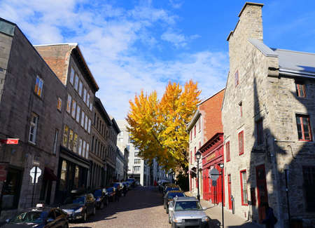 Old Montreal, Canada - October 27, 2019 - The view of the street, stores, restaurants and buildings in the city during Fall seasonのeditorial素材