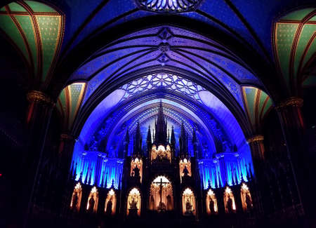 Montreal, Canada - October 28, 2019 - The view of lighted up altar and structures inside Notre Dame churchのeditorial素材