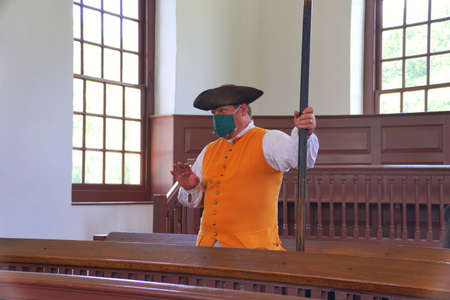Williamsburg, Virginia, U.S.A - June 30, 2020 - A man wearing a mask as required inside the...