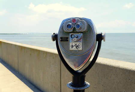 Virginia, U.S.A - June 29, 2020 - The coin-operated public binocular facing Chesapeake Bay Bridge Tunnelのeditorial素材